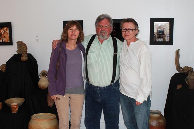 At the Campbellsville University anagama firing exhibit were from left: Davie Reneau, CU assistant professor of art; Wayne Ferguson, artist from Louisville, Ky., and Suzanne Renfrow, a potter from Morgantown, Ky. The three have fired many kilns throughout the last 20 years or so. (Campbellsville University Photo by Ye Wei “Vicky”)