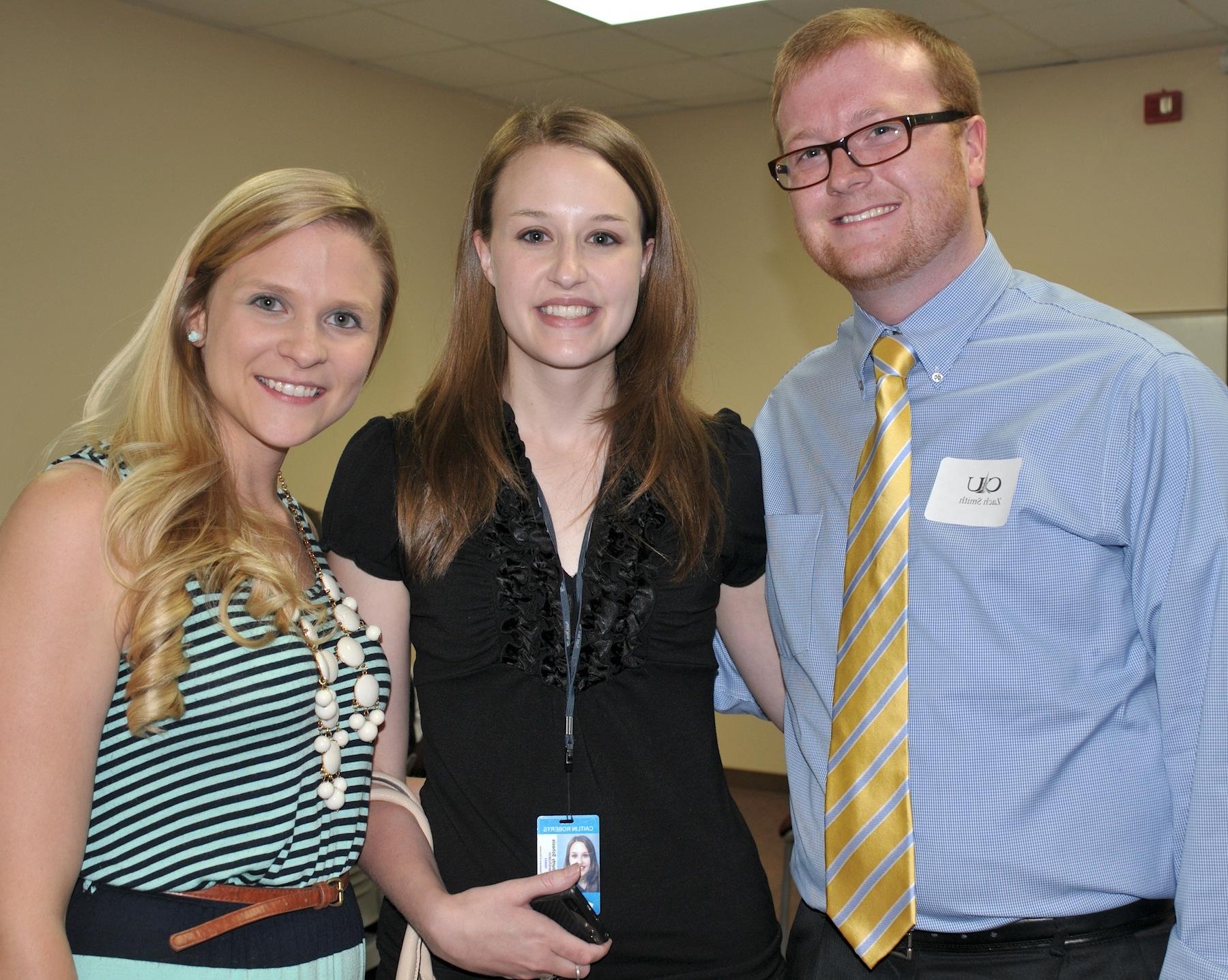 CU alumni in attendance at the May 8 Campaign dinner were, from left: Zach Smith, left, a 2013 graduate and admissions counselor; with his sister Cait Roberts, center, and Megan Massey who was her roommate and 2010 fellow graduate. (Campbellsville University Photo by Linda Waggener)