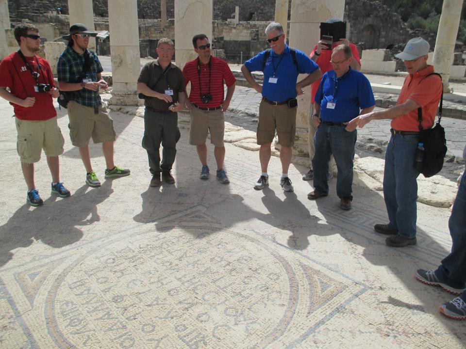 Dr. John Hurtgen interprets the Greek  writing found on the floor of this very old  temple. From left: Hurtgen, David Wray, Rev.  Ed Pavy, Rev. Brad Lauer, Tommy Ramey,  Aron Neal and Joey Bomia.